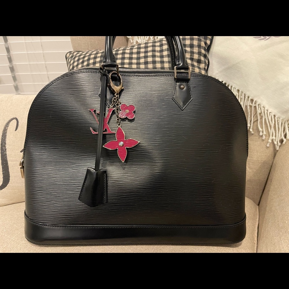 Authentic LV Epi Alma GM with charm